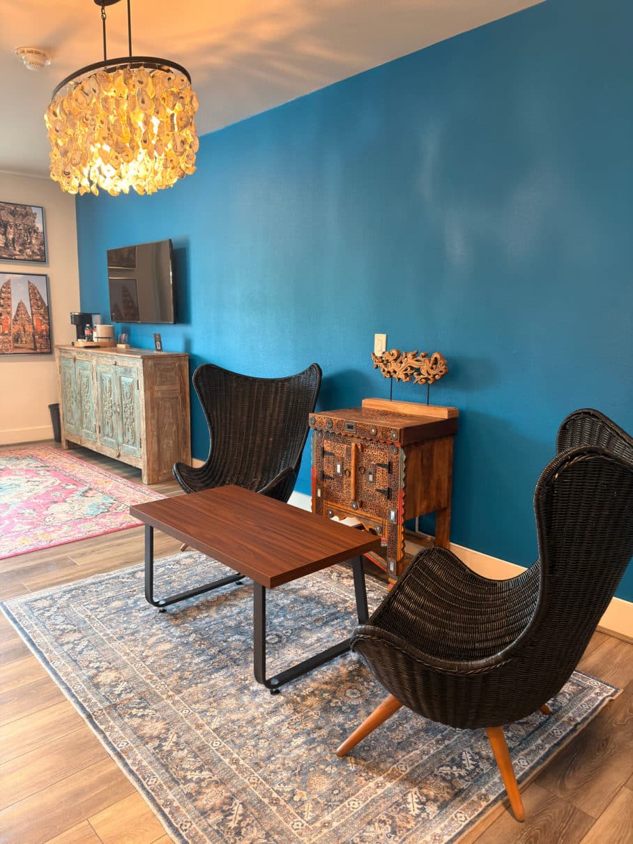 Terracotta suite with layered rugs
